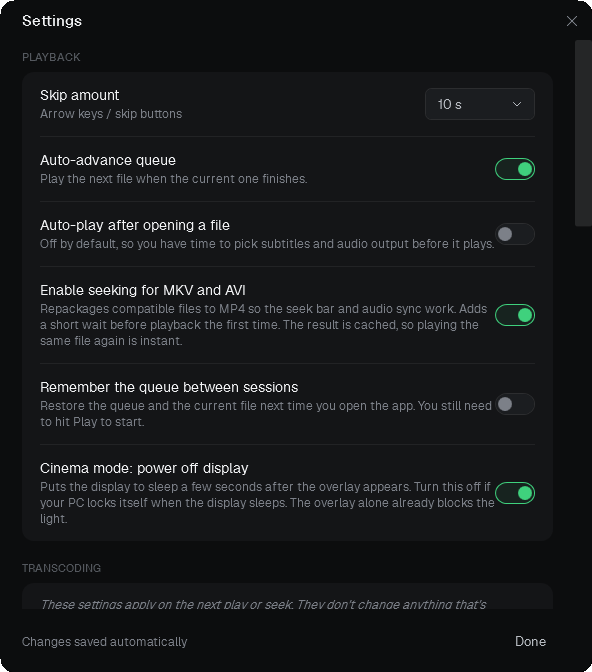 Settings window showing Playback options: skip amount, MKV and AVI seeking, convert for sync, auto-advance queue, auto-play, and remember-queue toggles.